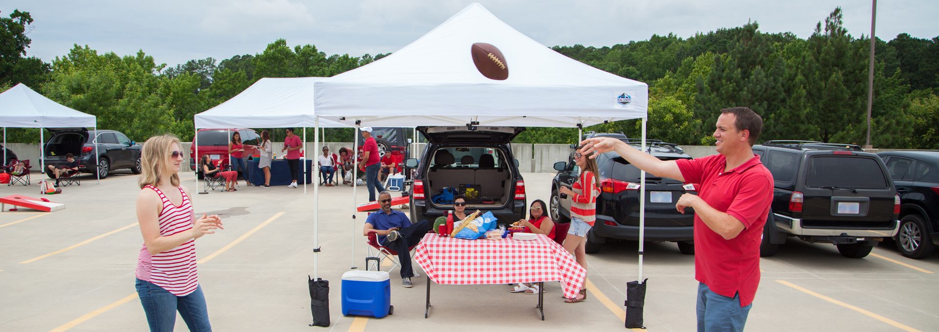 King Canopy instant pop-up canopies at a tailgate
